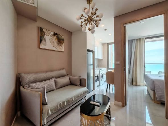 living room and bedroom of Copacabana Beach Jomtien