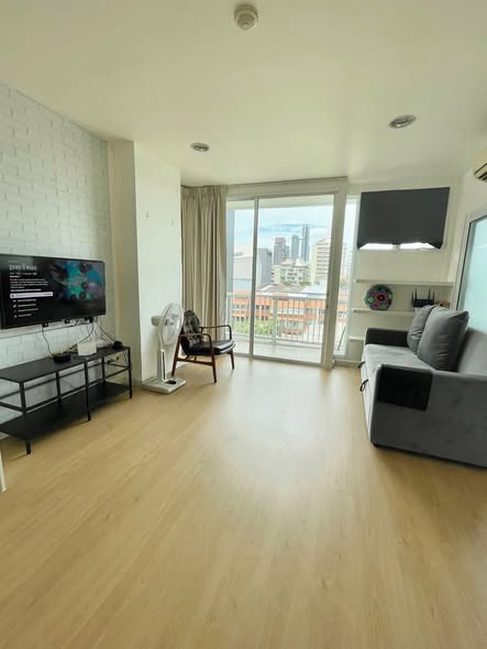 living room and bedroom of D65 Condominium