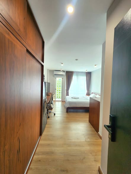 bedroom and room interior of i-House Laguna Garden RCA – Building A (Blue)