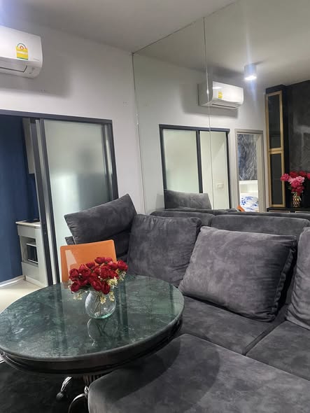 living room and bedroom of IDEO Rama9 – Asoke