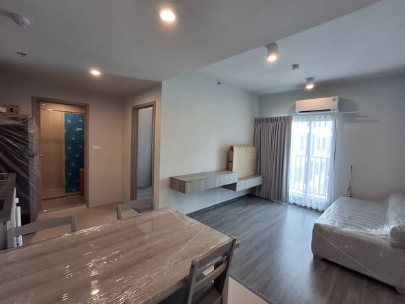 bedroom and living room of Ideo Ramkamhaeng Lamsali Station
