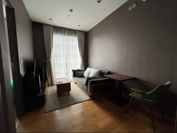 bedroom and living room of Keyne by Sansiri
