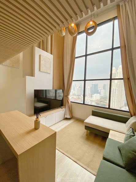 bedroom and living room of KnightsBridge Prime Sathon
