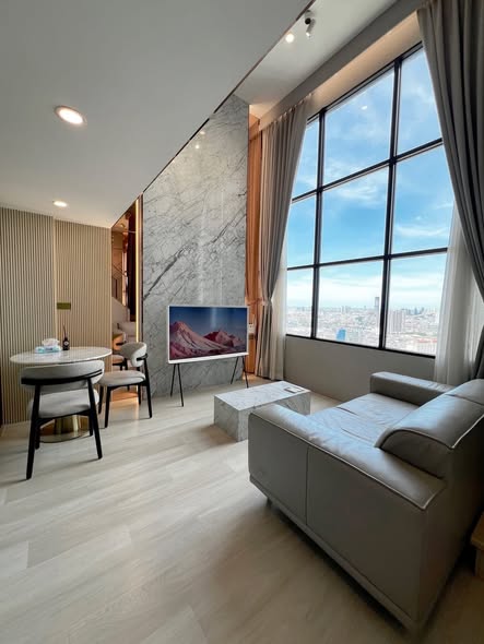 living room and bedroom of KnightsBridge Prime Sathon