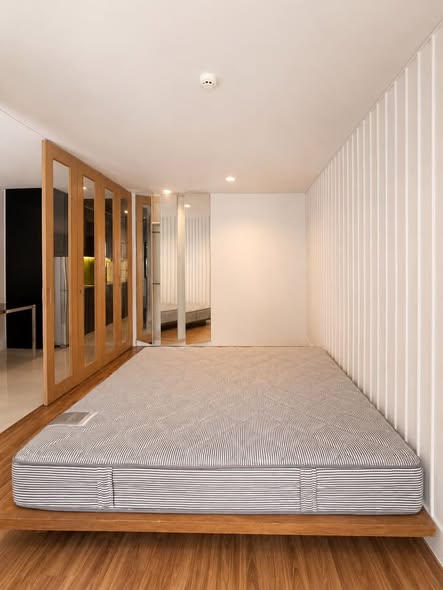 bedroom and room interior of L Style Condo