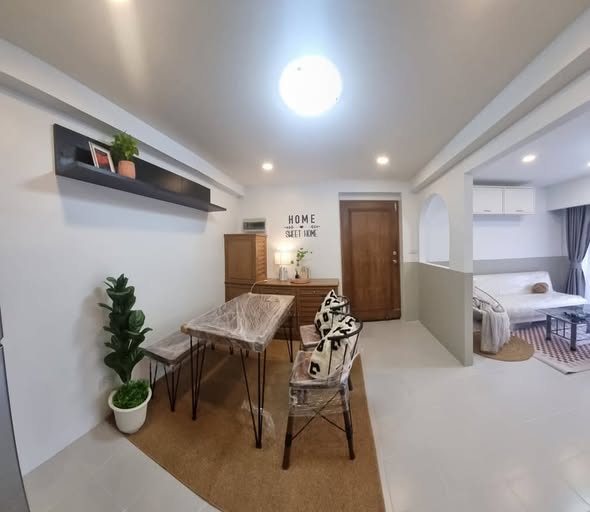living room of ปาล์ม พาวิลเลี่ยน คอนโดมิเนียม