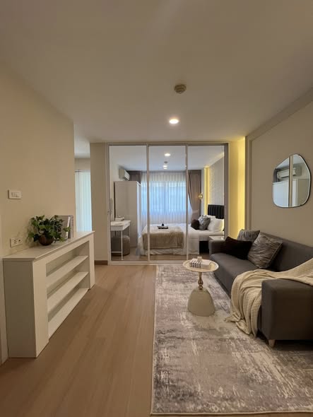 bedroom and living room of Lumpini Condo Town Bodindecha-Ramkhamhaeng