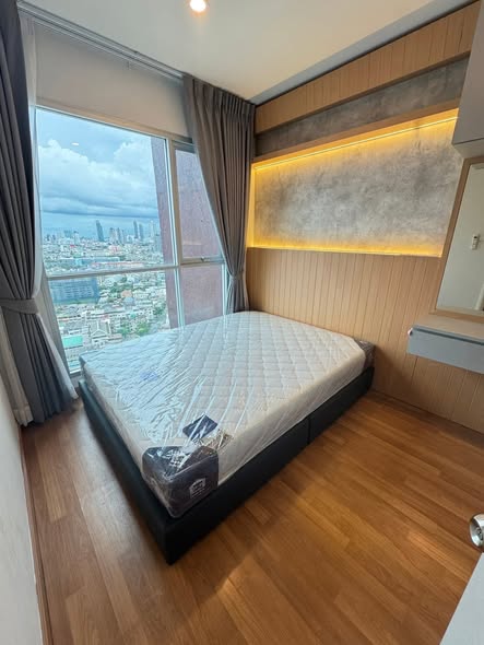bedroom of Lumpini Place Ratchada-Tha Phra
