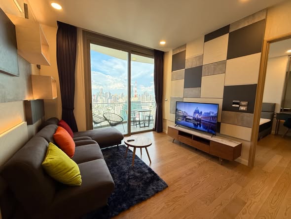 living room and bedroom of Magnolias Waterfront Residences