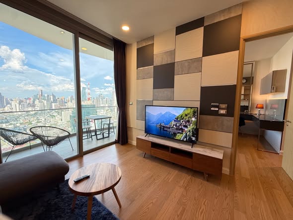 living room and bedroom of Magnolias Waterfront Residences