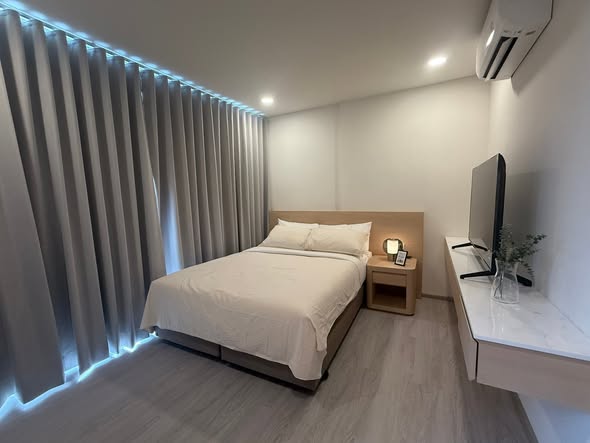 bedroom and bathroom of Malanan Modern Townhome
