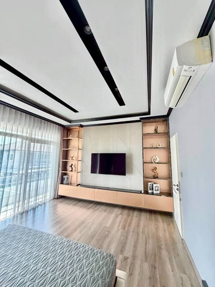 living room and bedroom of Mantana 2 Bangna Km. 7
