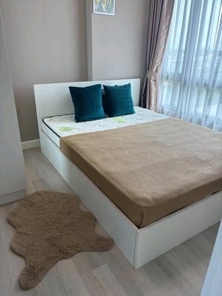 bedroom of Metro Luxe Riverfront Rattanathibet