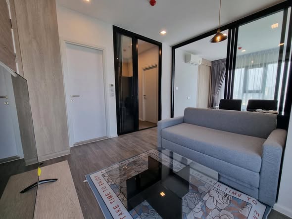 living room and bedroom of Modiz Sukhumvit 50 โมดิซ สุขุมวิท 50