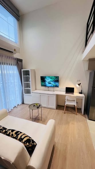 bedroom and living room of Na Reva Charoennakhon
