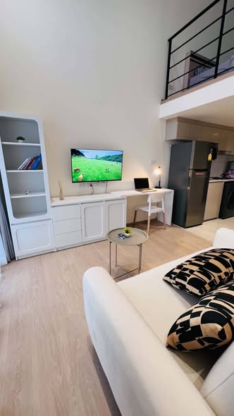 living room and bedroom of Na Reva Charoennakhon
