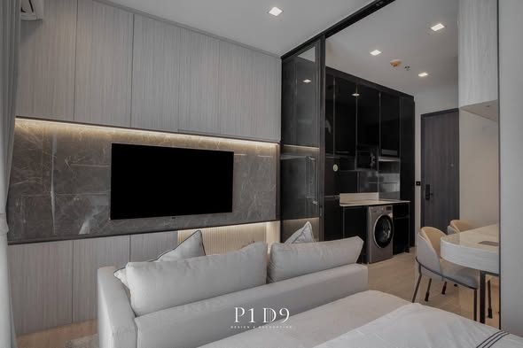 bedroom and living room of Noble Around Ari