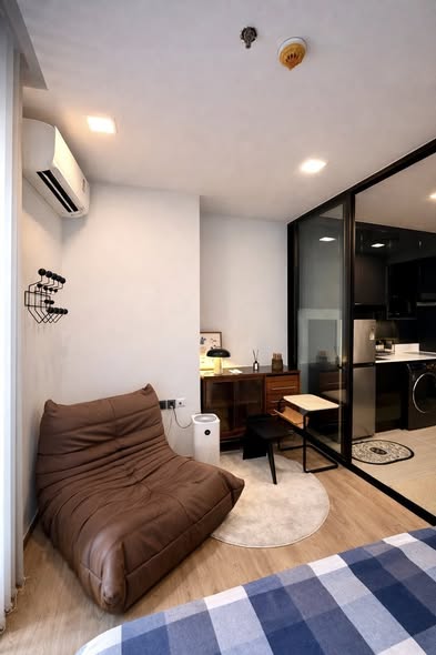 bedroom and living room of Noble Around Ari