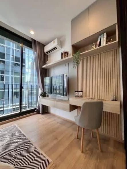 bedroom and living room of Noble Around Ari
