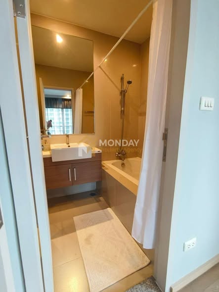 bedroom and bathroom of Noble Refine