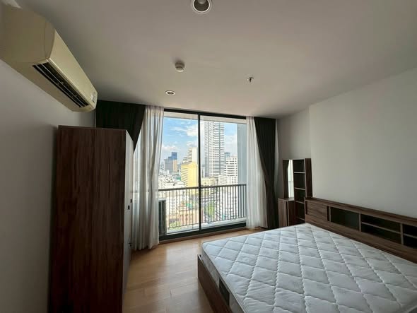 bedroom of Noble Revo Silom