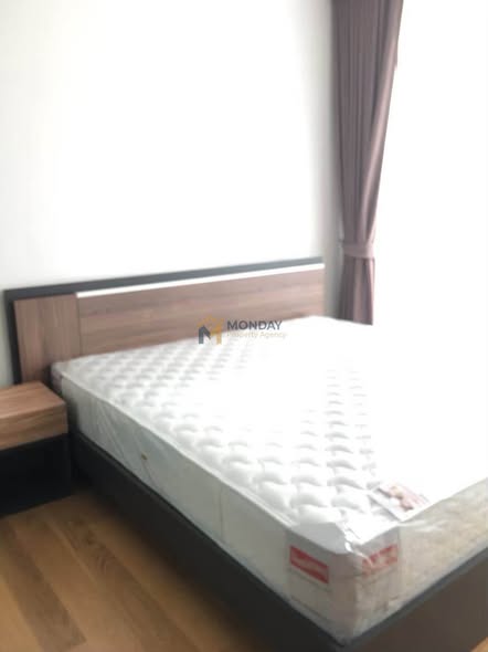 bedroom of Noble Revo Silom