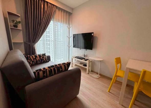 bedroom and living room of Noble Revolve Ratchada 1