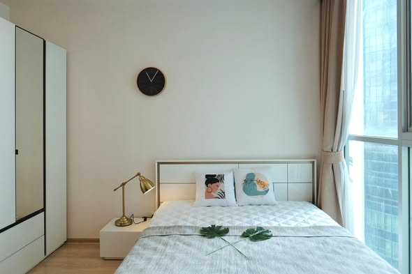 bedroom of Noble Revolve Ratchada 2
