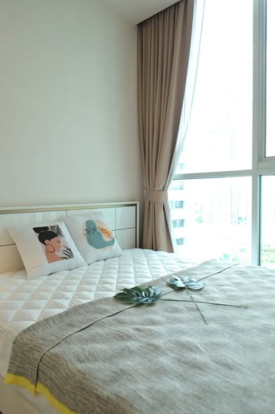 bedroom of Noble Revolve Ratchada 2
