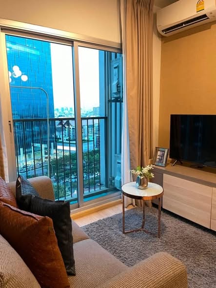 bedroom and living room of Noble Revolve Ratchada 2