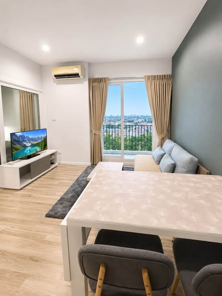living room and bedroom of North 2 Condo นอร์ท 2 คอนโด