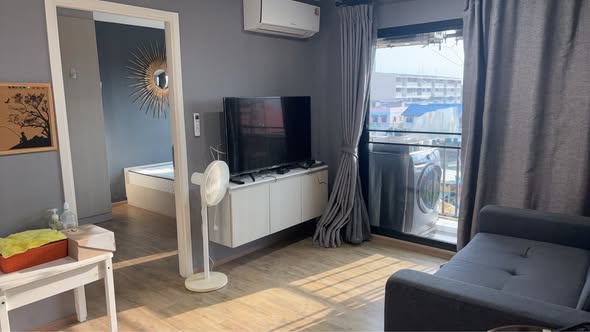bedroom and living room of Notting Hill Phahol – Kaset