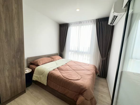 bedroom of Nue Cross Khu Khot Station (นิว ครอส คูคต สเตชัน)