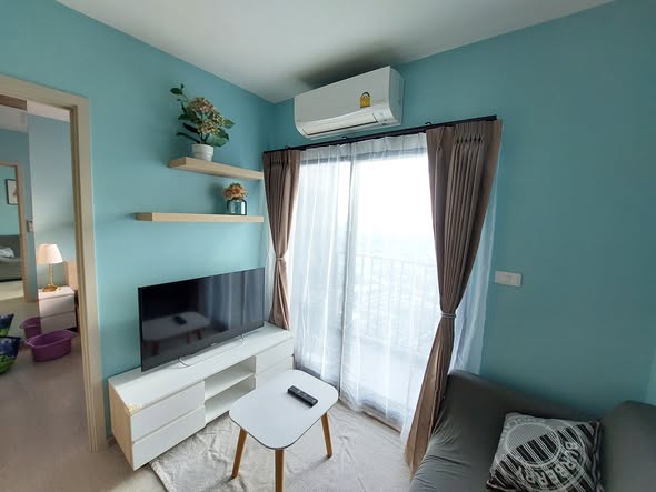 living room and bedroom of NUE Noble Srinakarin Lasalle นิว โนเบิล ศรีนครินทร์ – ลาซาล