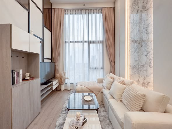 living room of Origin Plug & Play Nonthaburi Station