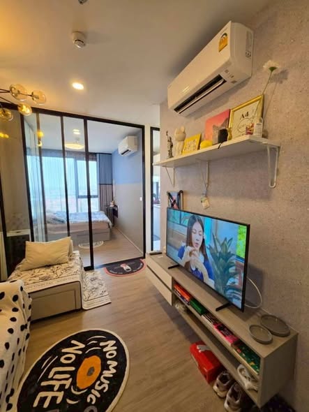 living room of Origin Plug & Play Nonthaburi Station