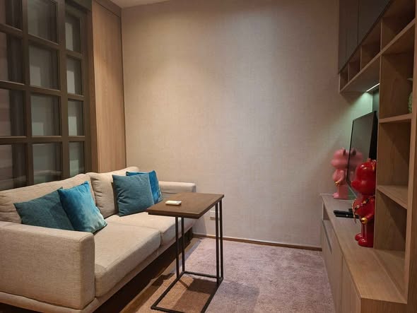 living room and bathroom of Park Origin Phrom Phong
