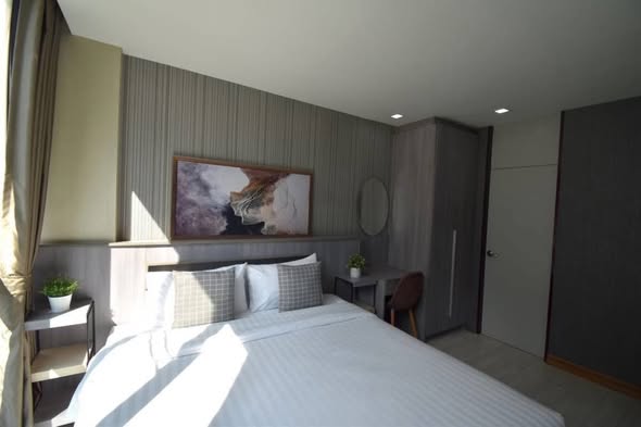 bedroom of Qube Suites Sukhumvit 46