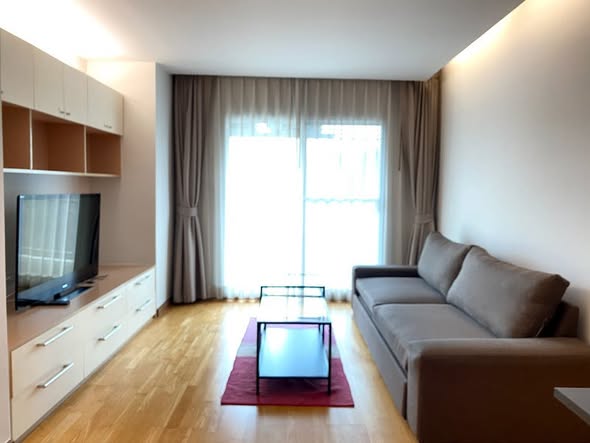 bedroom and living room and room interior of Residence 52 Condominium