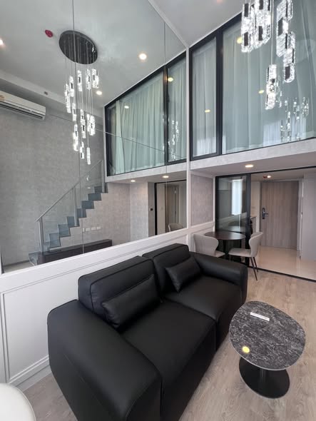 living room and room interior of SOHO​ BANGKOK​ RATCHADA​