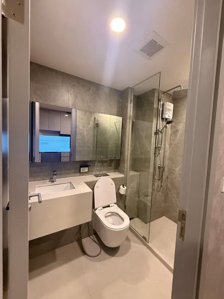 room interior and bathroom of SOHO​ BANGKOK​ RATCHADA​