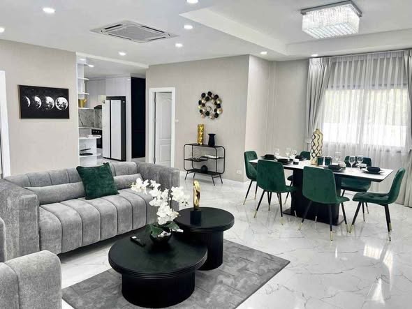 living room and room interior of Somkid pool villa loft cafe บ้านพักพูลวิลล่าพัทยา จอมเทียน พัทยาใต้
