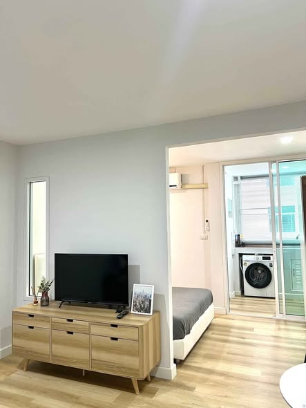 living room and bedroom of SR Condominium