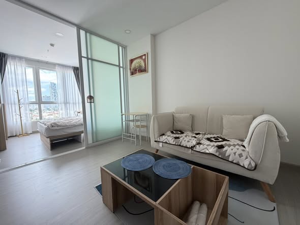 bedroom and living room of Supalai Loft Sathon-Ratchaphruek