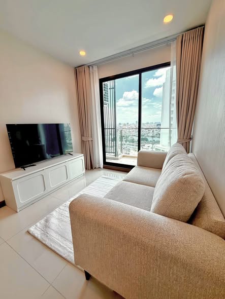 living room and bedroom of Supalai Premier Charoen Nakhon