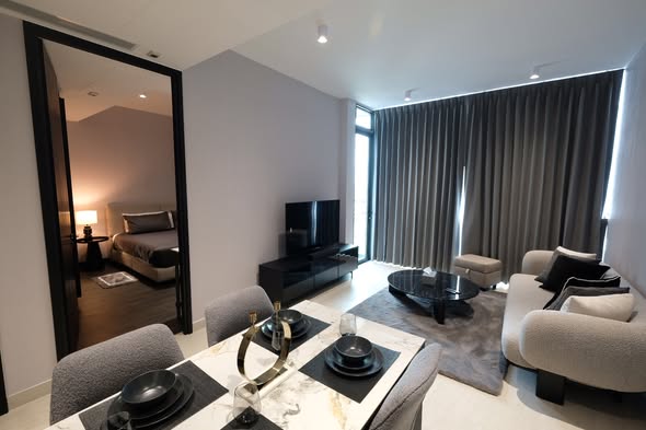 living room and bedroom of Tait Sathorn 12