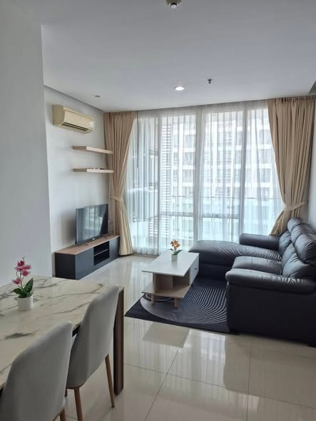 bedroom and living room of TC-Green Condominium