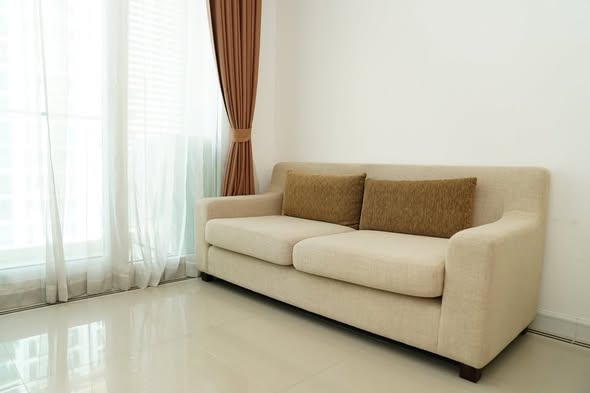 bedroom and living room of TC-Green Condominium