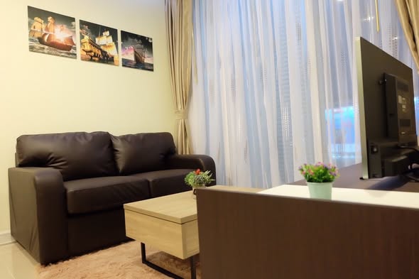 bedroom and living room of TC-Green Condominium