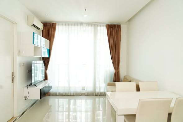 bedroom and living room of TC-Green Condominium